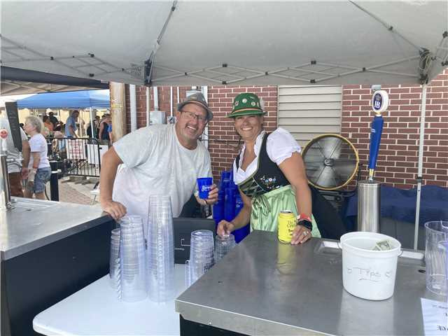 The Oasis German Beer Servers Matt & Gina